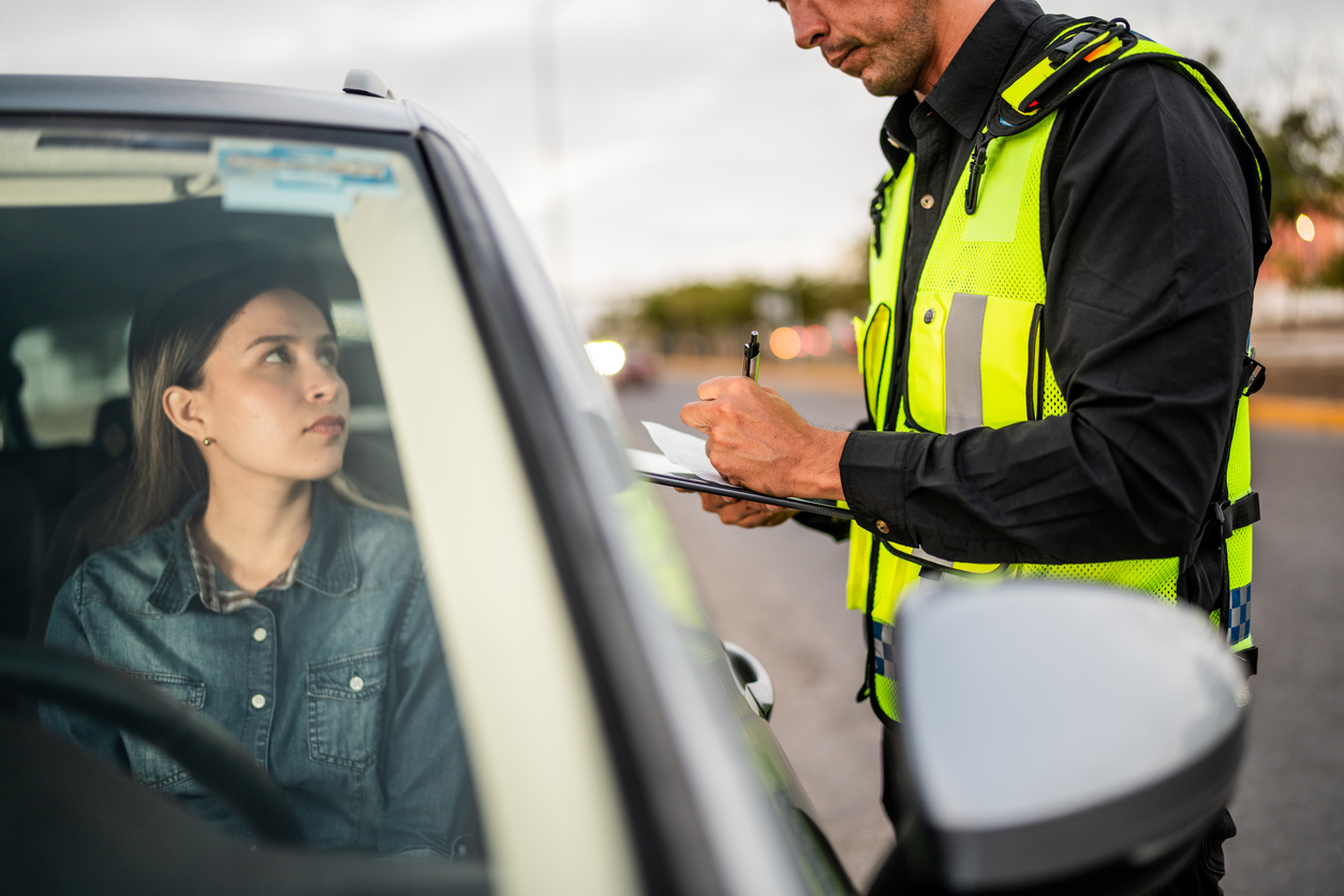Cop giving girl ticket